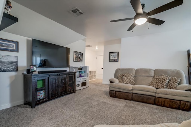 4145 Thunderhead Rd, Norman, OK 73072 - carpeted living area with a ceiling fan and baseboards