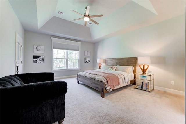 8350 Red Feather, Arcadia, OK 73007 - bedroom featuring a tray ceiling, visible vents, baseboards, a ceiling fan, and carpet floors