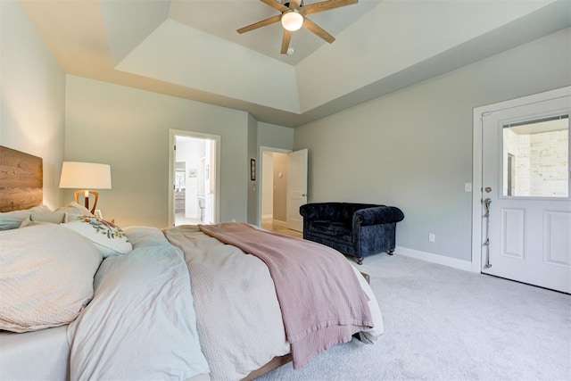 8350 Red Feather, Arcadia, OK 73007 - carpeted bedroom with a raised ceiling, ensuite bath, baseboards, and ceiling fan