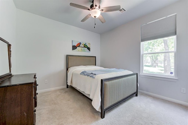 8350 Red Feather, Arcadia, OK 73007 - bedroom featuring ceiling fan, visible vents, baseboards, and light carpet