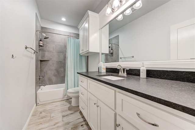 8350 Red Feather, Arcadia, OK 73007 - bathroom featuring vanity, shower / bath combination with curtain, baseboards, toilet, and recessed lighting