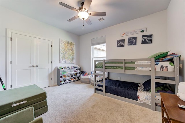 8350 Red Feather, Arcadia, OK 73007 - bedroom with a ceiling fan, visible vents, carpet, and a closet