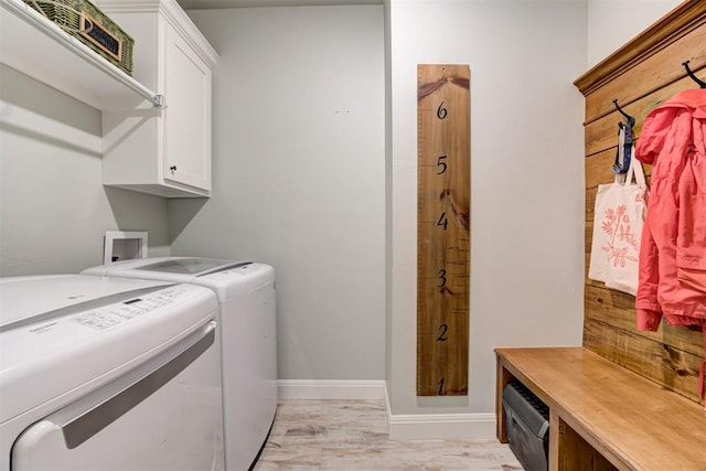 8350 Red Feather, Arcadia, OK 73007 - laundry area featuring baseboards, washer and dryer, and cabinet space