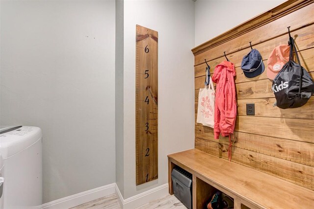 8350 Red Feather, Arcadia, OK 73007 - mudroom featuring separate washer and dryer and baseboards