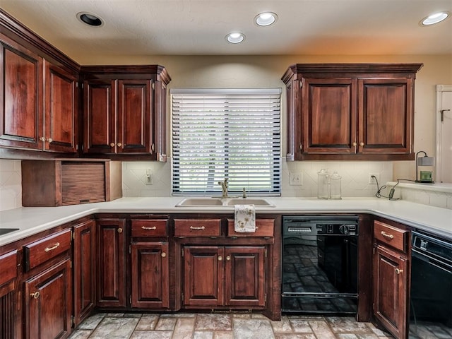 kitchen featuring decorative backsplash, a sink, light countertops, recessed lighting, and black dishwasher