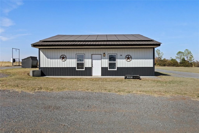 exterior space with metal roof