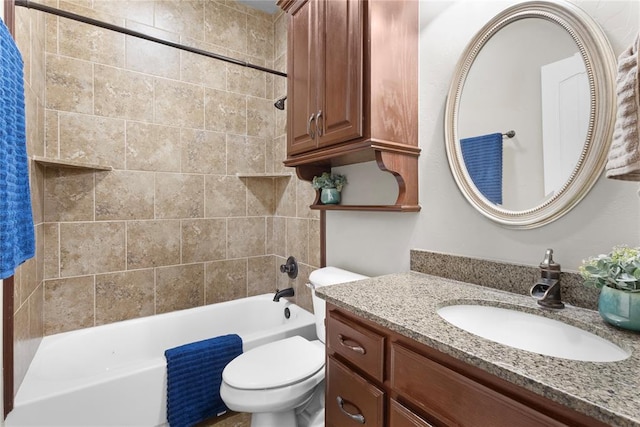 full bath with shower / bath combination, vanity, and toilet