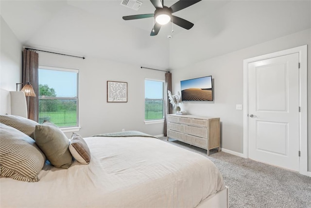 3320 Lola Ct, Moore, OK 73160 - bedroom with visible vents, lofted ceiling, baseboards, ceiling fan, and carpet