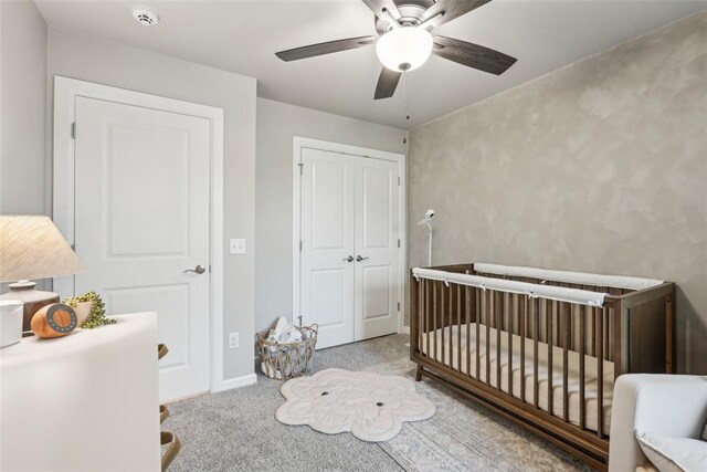 3320 Lola Ct, Moore, OK 73160 - bedroom with a closet, a ceiling fan, and carpet flooring