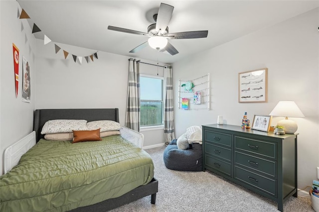 3320 Lola Ct, Moore, OK 73160 - bedroom featuring baseboards, light carpet, a ceiling fan, and visible vents