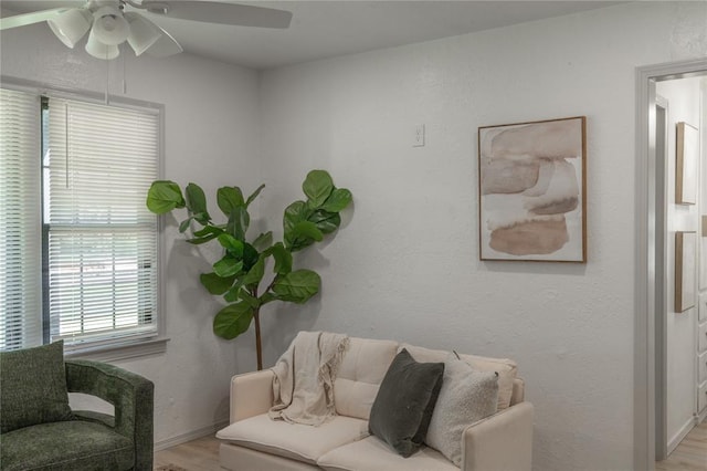 3224 NW 47th St, Oklahoma City, OK 73112 - living room with baseboards, wood finished floors, and ceiling fan