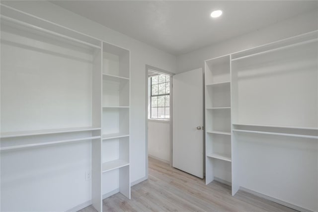 3224 NW 47th St, Oklahoma City, OK 73112 - walk in closet with wood finished floors