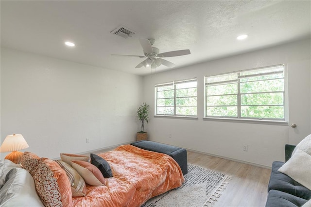 3224 NW 47th St, Oklahoma City, OK 73112 - bedroom with baseboards, recessed lighting, visible vents, and light wood finished floors