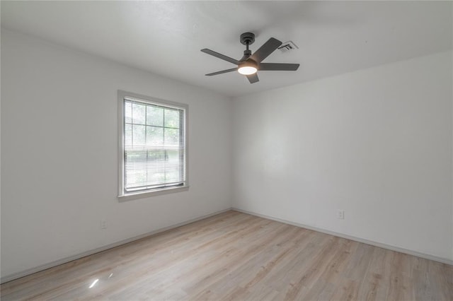 3224 NW 47th St, Oklahoma City, OK 73112 - empty room with wood finished floors, ceiling fan, visible vents, and baseboards