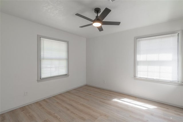 3224 NW 47th St, Oklahoma City, OK 73112 - empty room featuring wood finished floors, ceiling fan, and baseboards