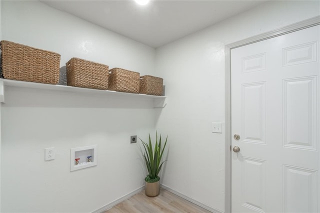 3224 NW 47th St, Oklahoma City, OK 73112 - clothes washing area with washer hookup, laundry area, electric dryer hookup, light wood-style flooring, and baseboards