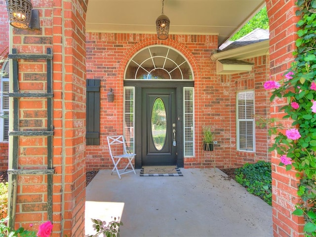 3401 Kentucky Way, Edmond, OK 73034 - view of exterior entry with brick siding