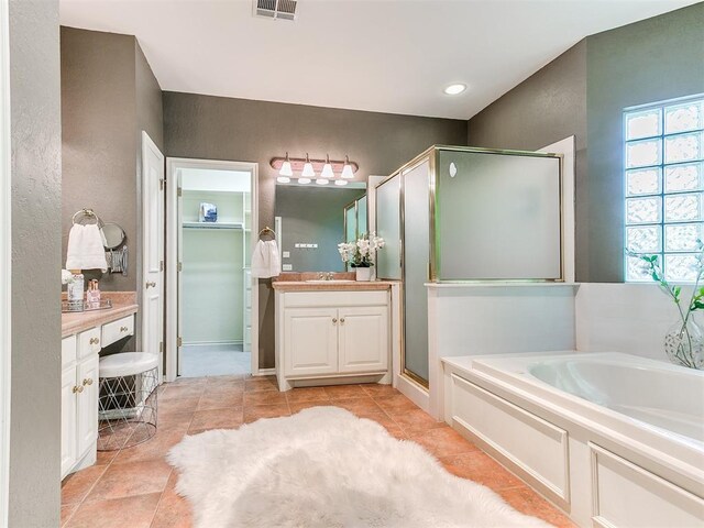 3401 Kentucky Way, Edmond, OK 73034 - bathroom featuring vanity, a wealth of natural light, and a stall shower