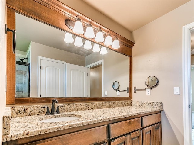 full bathroom with a shower and vanity