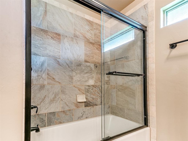 bathroom featuring enclosed tub / shower combo