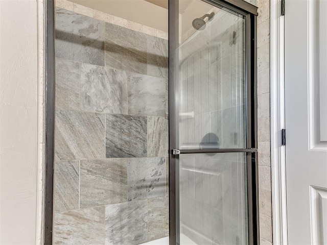 bathroom featuring a stall shower