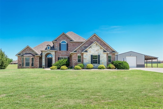 french country inspired facade with brick siding, driveway, and a front yard