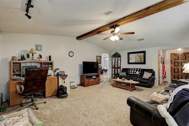 carpeted living area featuring visible vents, lofted ceiling with beams, a textured ceiling, and ceiling fan