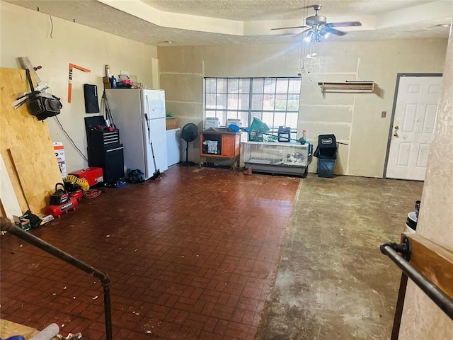 garage featuring a ceiling fan