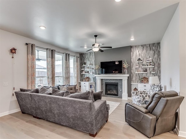 15936 Buffalo Dr, Oklahoma City, OK 73170 - living area with recessed lighting, light wood-style floors, a high end fireplace, baseboards, and a ceiling fan