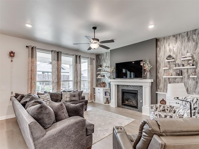 15936 Buffalo Dr, Oklahoma City, OK 73170 - living room featuring recessed lighting, ceiling fan, baseboards, a high end fireplace, and wood finished floors
