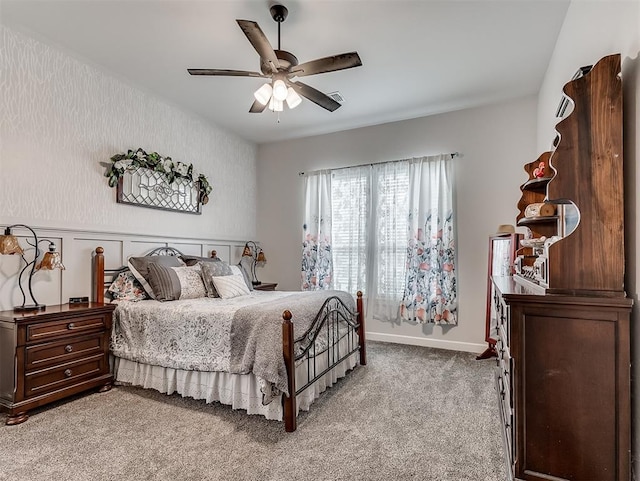 15936 Buffalo Dr, Oklahoma City, OK 73170 - carpeted bedroom featuring baseboards, a wainscoted wall, and a ceiling fan