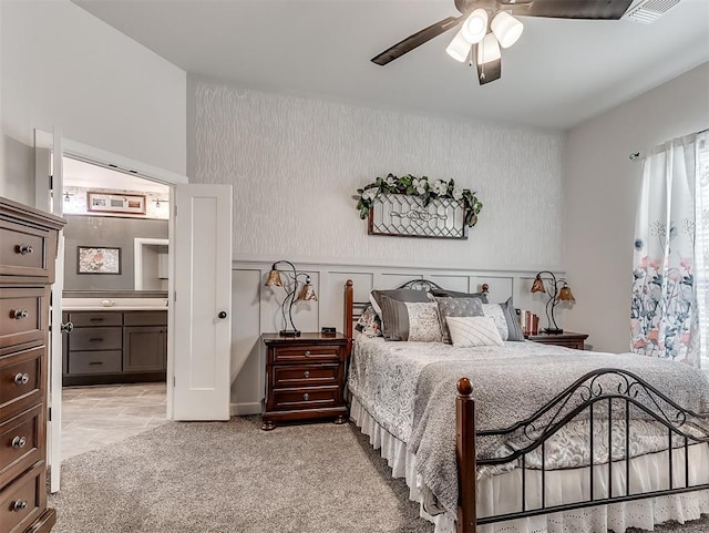 15936 Buffalo Dr, Oklahoma City, OK 73170 - bedroom with a ceiling fan, visible vents, light carpet, and ensuite bathroom