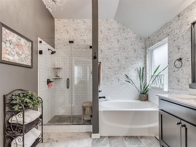 15936 Buffalo Dr, Oklahoma City, OK 73170 - full bathroom featuring vanity, tile patterned floors, a stall shower, a garden tub, and wallpapered walls