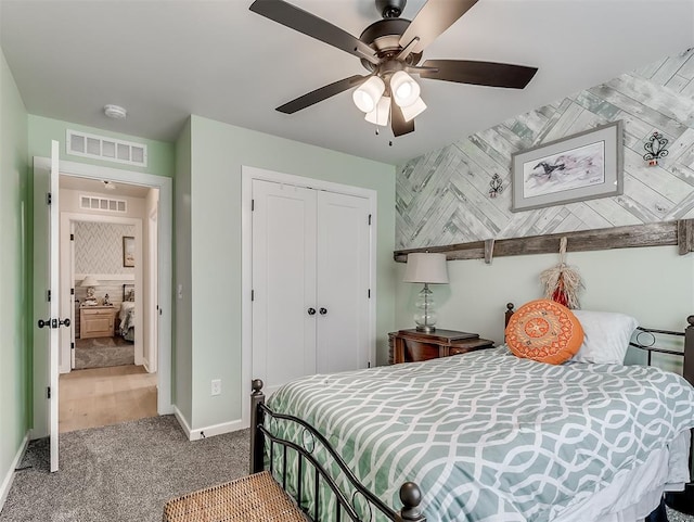 15936 Buffalo Dr, Oklahoma City, OK 73170 - carpeted bedroom with visible vents, ceiling fan, baseboards, and a closet