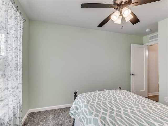 15936 Buffalo Dr, Oklahoma City, OK 73170 - carpeted bedroom with baseboards, visible vents, and ceiling fan