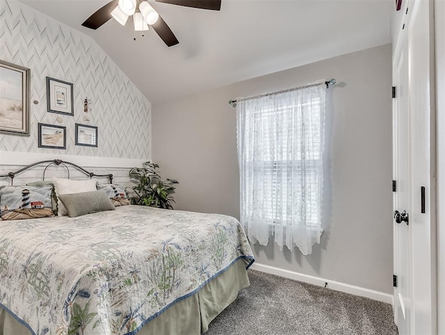15936 Buffalo Dr, Oklahoma City, OK 73170 - carpeted bedroom featuring wallpapered walls, baseboards, an accent wall, a ceiling fan, and lofted ceiling