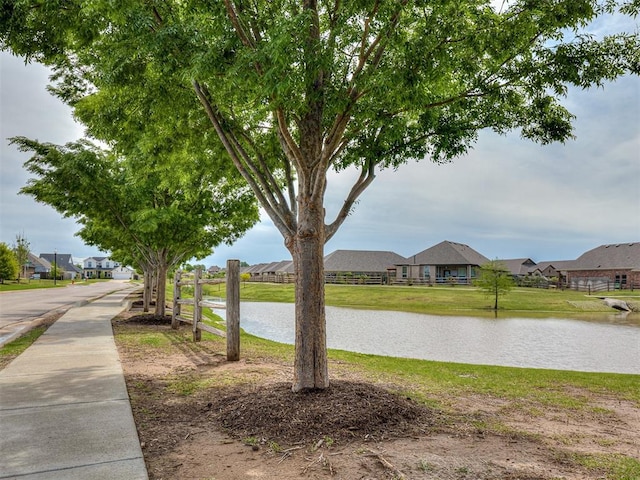 15936 Buffalo Dr, Oklahoma City, OK 73170 - view of water feature featuring fence and a residential view