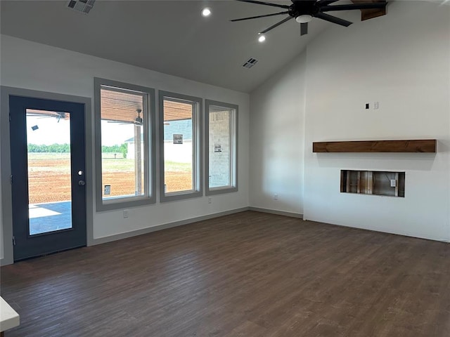 211 Shavano St, Shawnee, OK 74804 - unfurnished living room with ceiling fan, dark wood-style floors, high vaulted ceiling, recessed lighting, and baseboards
