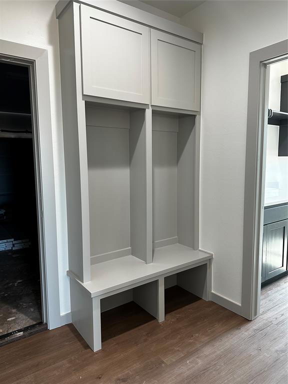 211 Shavano St, Shawnee, OK 74804 - mudroom featuring wood finished floors and baseboards