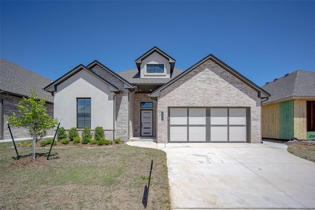 2909 SW 132nd St, Oklahoma City, OK 73170 - view of front facade featuring brick siding, driveway, a front yard, and a garage