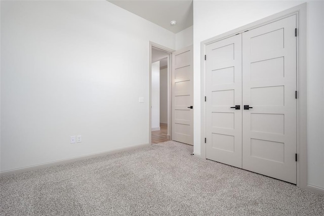 2909 SW 132nd St, Oklahoma City, OK 73170 - unfurnished bedroom featuring baseboards, a closet, and light colored carpet