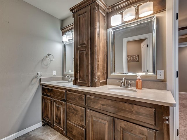 1832 Buckskin Ct, Blanchard, OK 73010 - full bathroom featuring baseboards, a sink, and double vanity