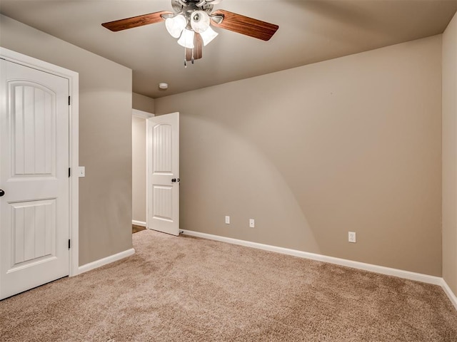 1832 Buckskin Ct, Blanchard, OK 73010 - unfurnished bedroom with carpet flooring, baseboards, and ceiling fan