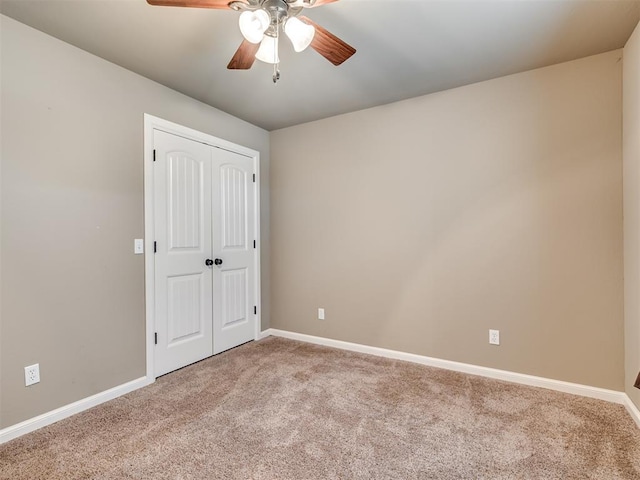 1832 Buckskin Ct, Blanchard, OK 73010 - unfurnished bedroom with baseboards, a ceiling fan, carpet flooring, and a closet