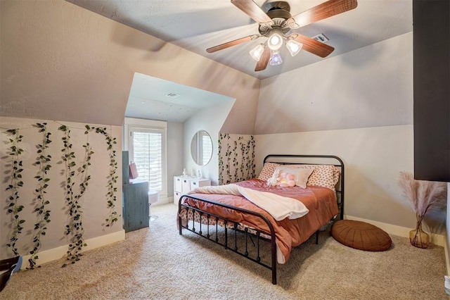 bedroom with a ceiling fan, baseboards, lofted ceiling, and carpet