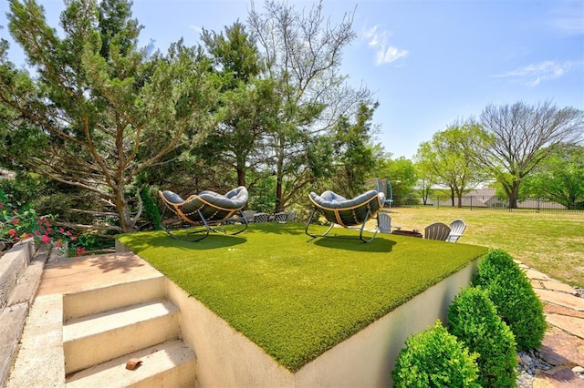 view of yard with fence