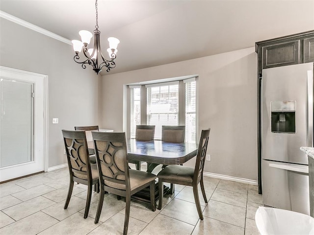13612 Calabria Trl, Oklahoma City, OK 73170 - dining area with ornamental molding, an inviting chandelier, light tile patterned flooring, and baseboards