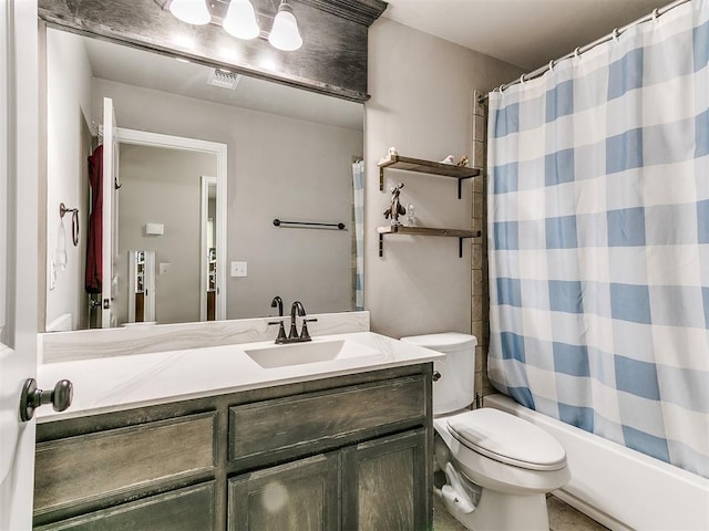 13612 Calabria Trl, Oklahoma City, OK 73170 - full bathroom with visible vents, shower / bath combo with shower curtain, vanity, and toilet