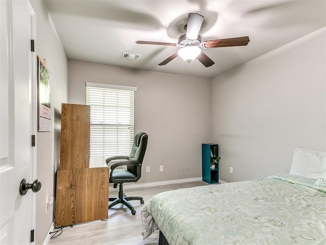 13612 Calabria Trl, Oklahoma City, OK 73170 - bedroom with ceiling fan, baseboards, light wood-style floors, and visible vents