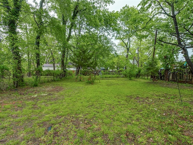 view of yard with fence